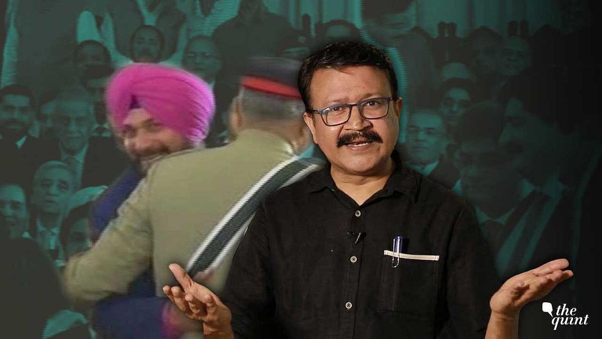 Has Navjot Sidhu defamed the nation by hugging Pakistan Army Chief Qamar Bajwa at Imran Khan’s oath-taking ceremony?