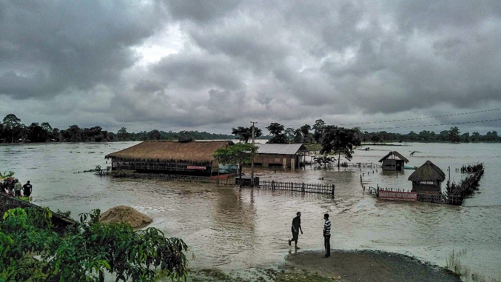 Partially submerged houses seen during flood after monsoon rainfall, in Golaghat on Thursday, 2 August, 2018.