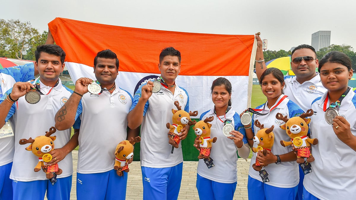 The Indian Men’s Compound Archery team and the Indian Women’s Compound Archery team after the medal ceremony