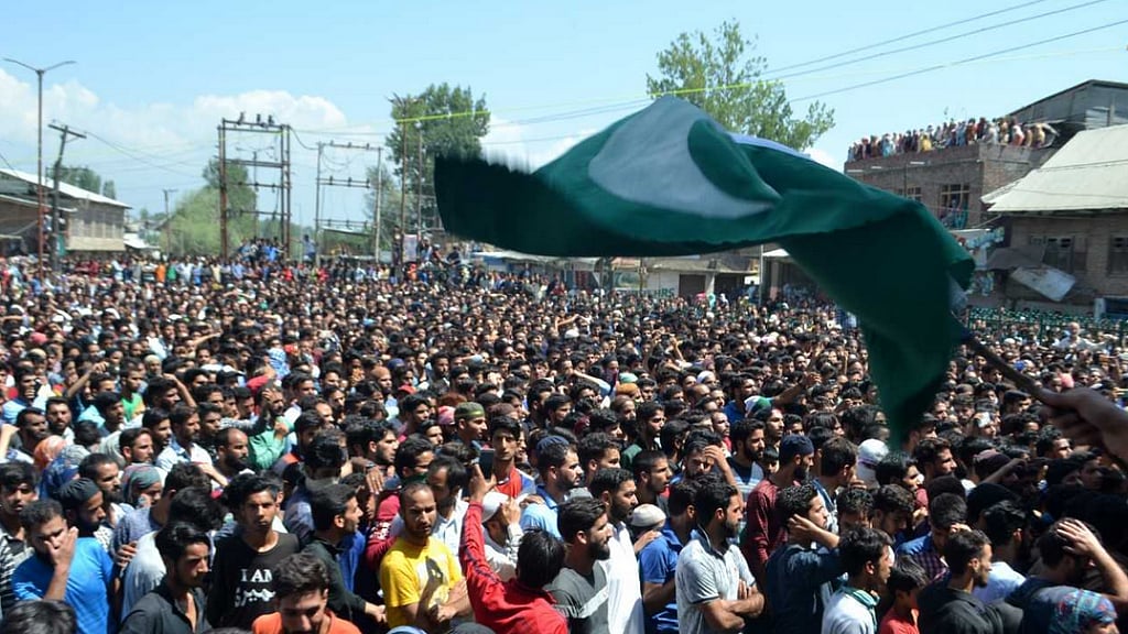 People gather at the funeral of Hizbul Mujahideen deputy field operations commander Altaf Dar alias Altaf Kachroo in Muniward.
