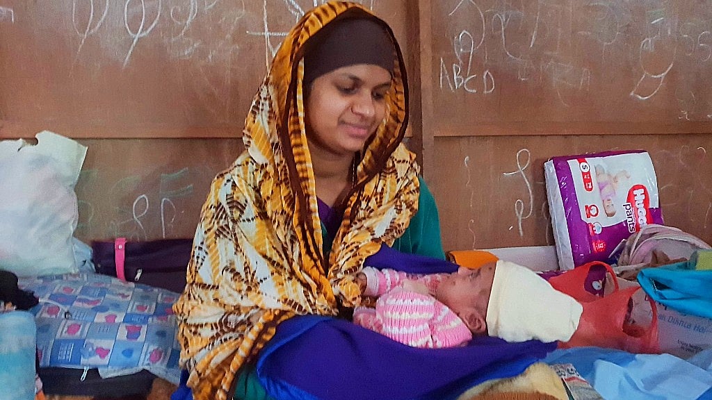 Part of the family that walked for nine hours was 25-year-old Shahina, who delivered 45 days ago.&nbsp;