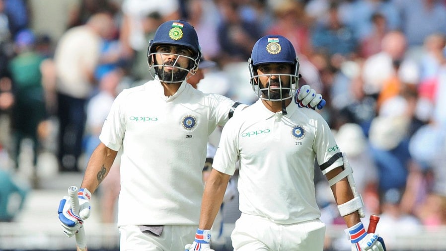 Virat Kohli and Ajinjya Rahane walk off the pitch during tea break.