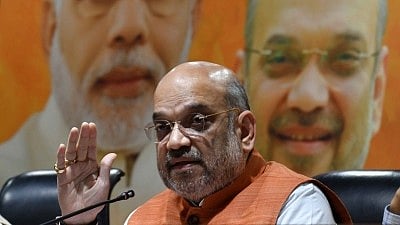 New Delhi: BJP chief Amit Shah addresses a press conference on the fourth anniversary of Narendra Modi-led BJP government, at the party headquarter in New Delhi on 26 May 2018. 