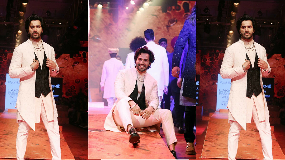 Varun Dhawan looks delighted to be walking the ramp at LFW 2018.