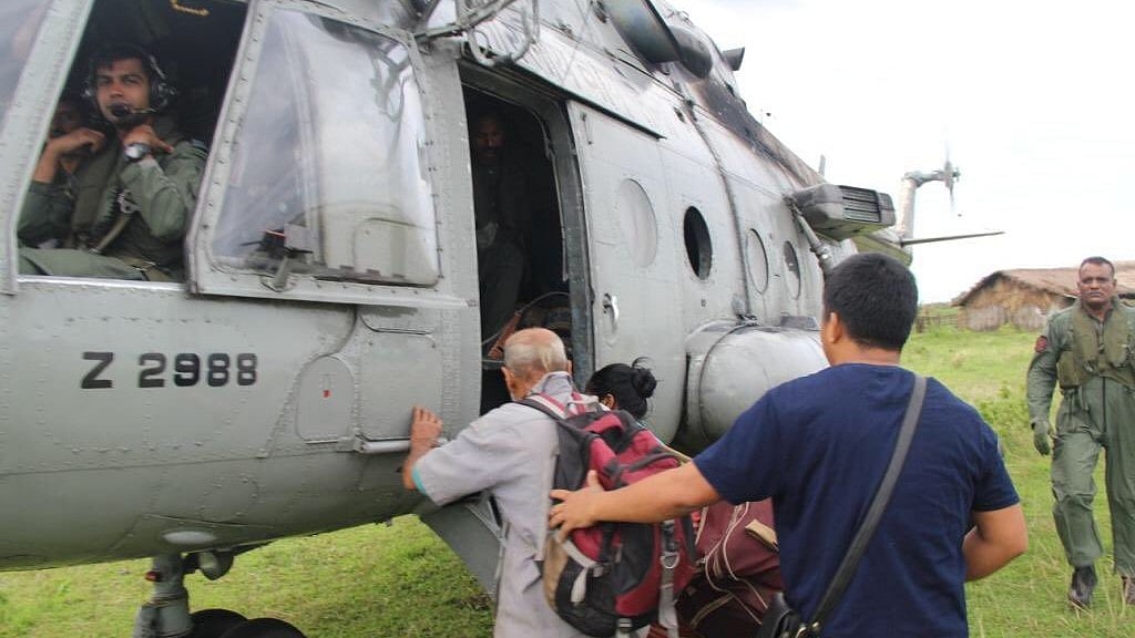 People being rescued from an island in Arunachal Pradesh by the Indian Air Force.
