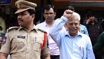 Maoist ideologue Varavara Rao being taken away by Maharashtra Police for his alleged involvement in a plot to assassinate Prime Minister Narendra Modi after his medical checkup at Gandhi Hospital, in Secunderabad, on 28 August.