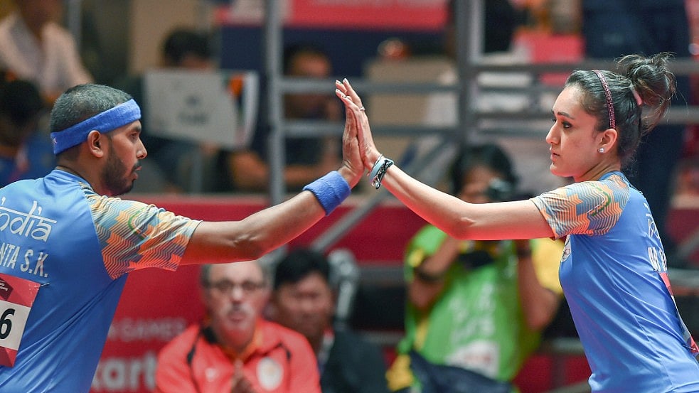 Sharath Kamal and Manika Batra in action on Day 11 of the Asian Games. 