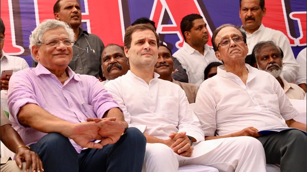CPI(M)’s Sitaram Yechury and Congress president Rahul Gandhi at the protest over the SC/ST Atrocities Bill, at Jantar Mantar, Delhi.
