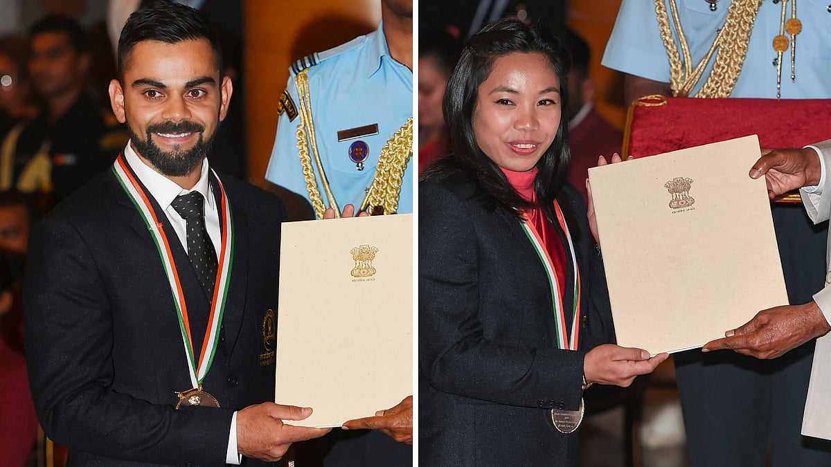 Virat Kohli and Mirabai Chanu with their Khel Ratna citations presented to them by President Ram Nath Kovind.