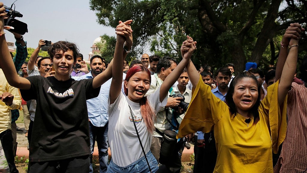 Individuals celebrate the historic judgment 377 judgment.&nbsp;