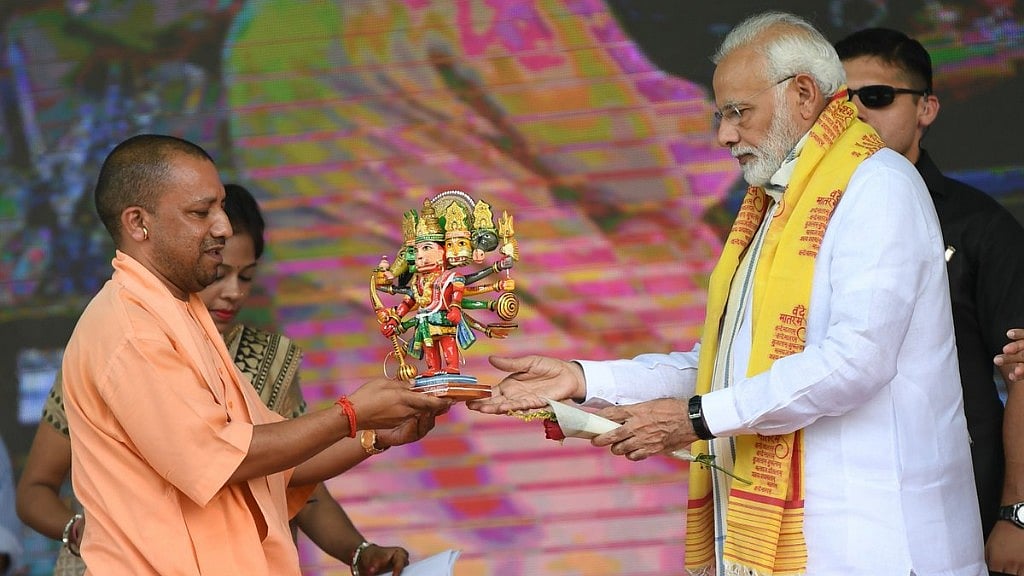 File image of PM Narendra Modi and UP CM Yogi Adityanath. Sinha has alleged that he received WhatsApp forwards which had objectionable messages against PM Narendra Modi and CM of UP Yogi Adityanath.