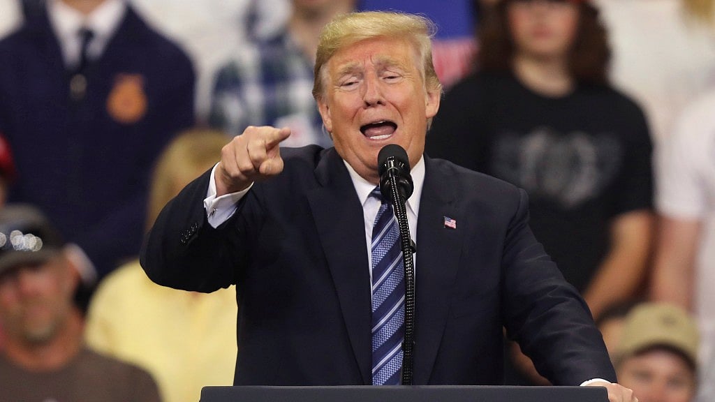US President Donald Trump speaks at a rally while campaigning for the upcoming mid-term elections.