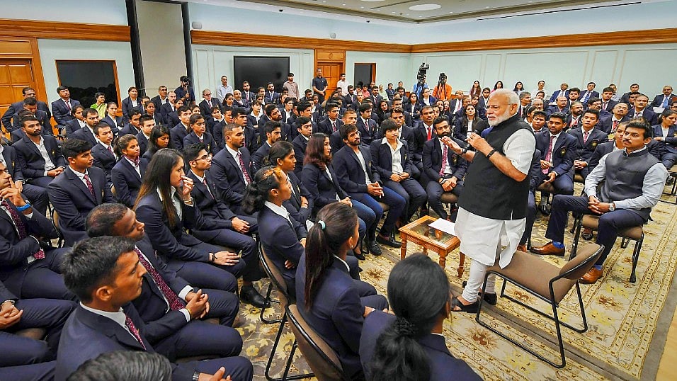 Prime Minister Narendra Modi interacting with Asian Games medallists at his residence on Wednesday. 