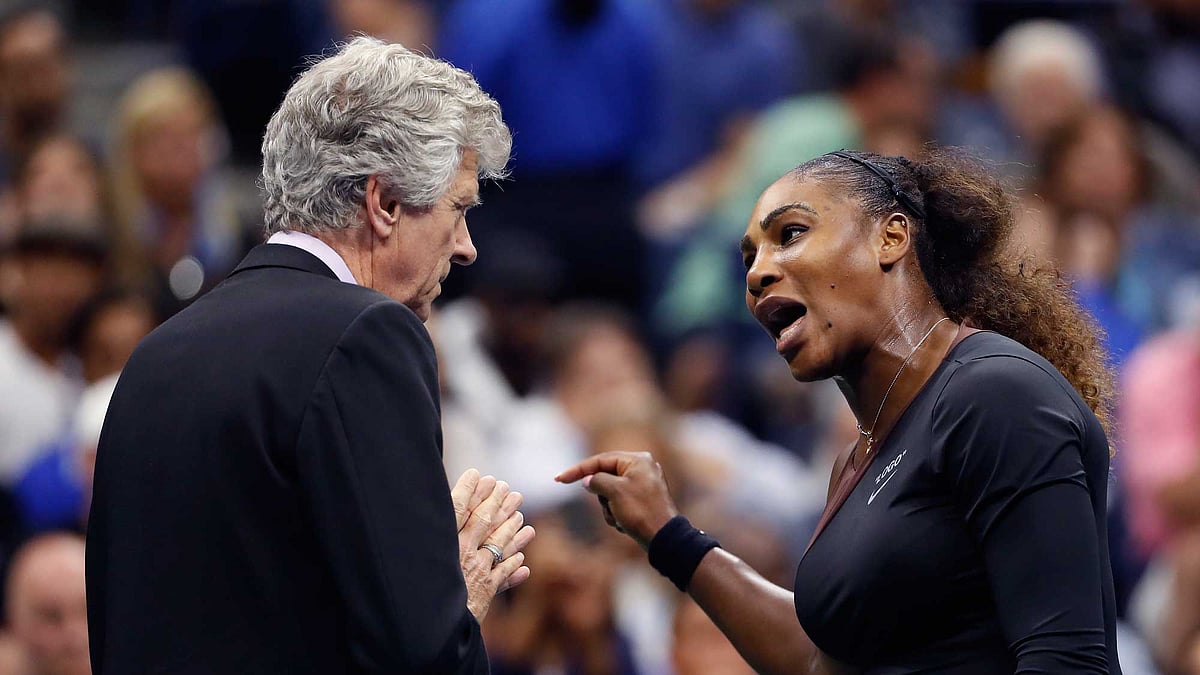 Serena Williams, right, talks with referee Brian Earley during the women’s final of the U.S. Open tennis tournament against Naomi Osaka, of Japan, Saturday, Sept. 8, 2018, in New York. 