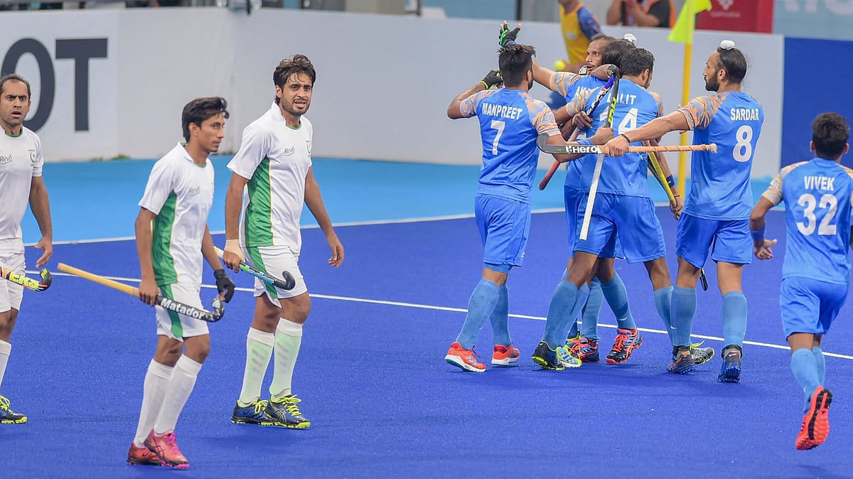 Akashdeep Singh celebrates with teammates after scoring their first goal against Pakistan during the India vs Pakistan bronze medal at the 2018 Asian Games.