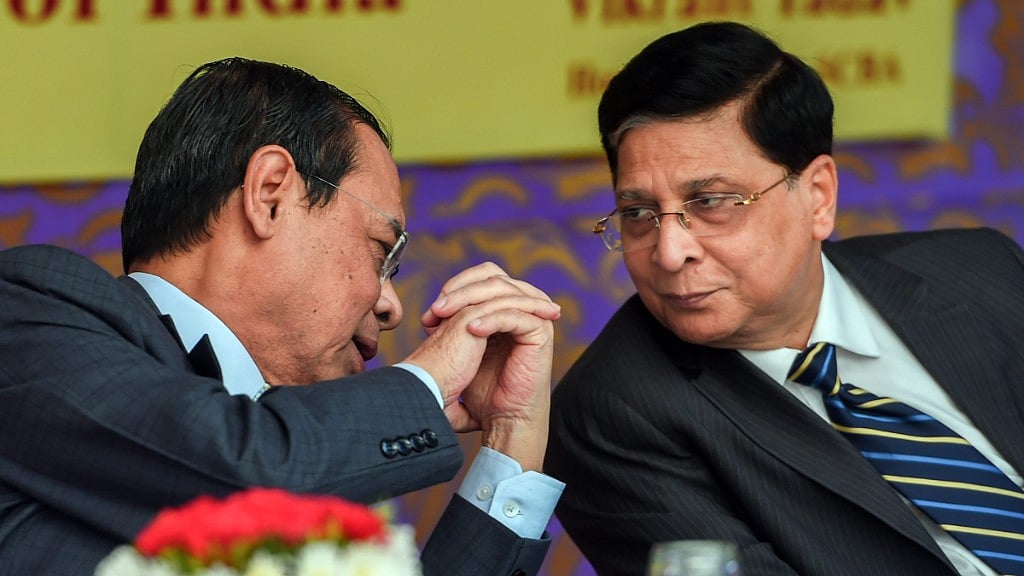 Chief Justice of India Justice Dipak Misra (R) and CJI-designate Justice Ranjan Gogoi during the launch of SCBA Group Life Insurance policy at the Supreme court lawns in New Delhi.