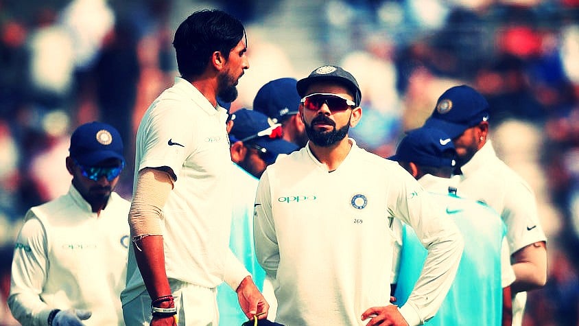 Virat Kohli speaks to Ishant Sharma during the fourth Test.