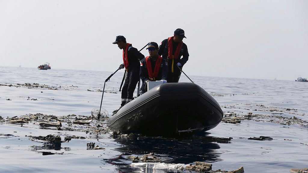 Rescuers conduct search operation in the waters of Ujung Karawang, West Java, Indonesia after a Lion Air plane crashed into the sea.