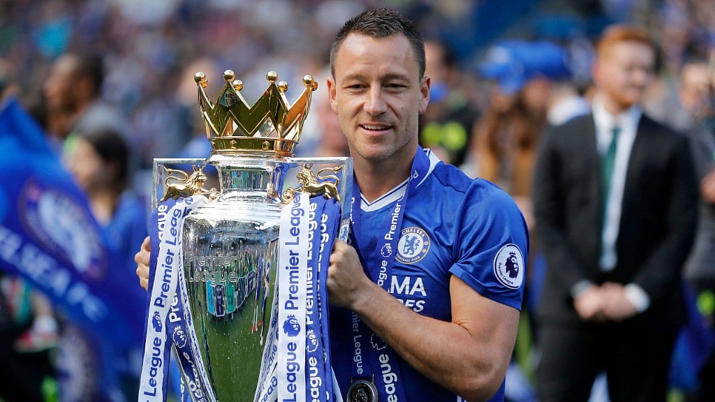 Chelsea captain John Terry wih the Premier League trophy after they won the league in 2017. 