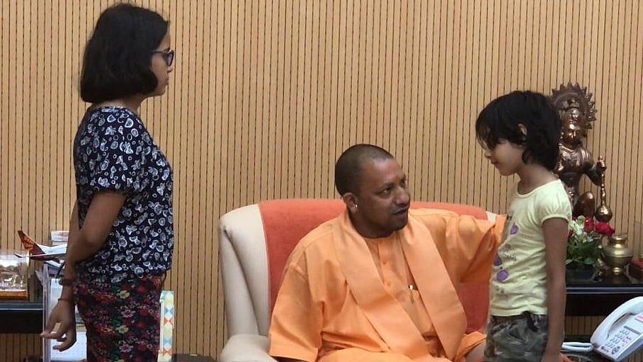 Uttar Pradesh CM Yogi Adityanath with Vivek Tiwari’s children.