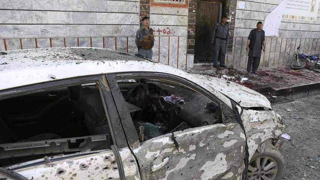 File image of Afghan police stand outside a voter registration center which was attacked by a suicide bomber in Kabul earlier in 2018. Image used for representational purposes only. 