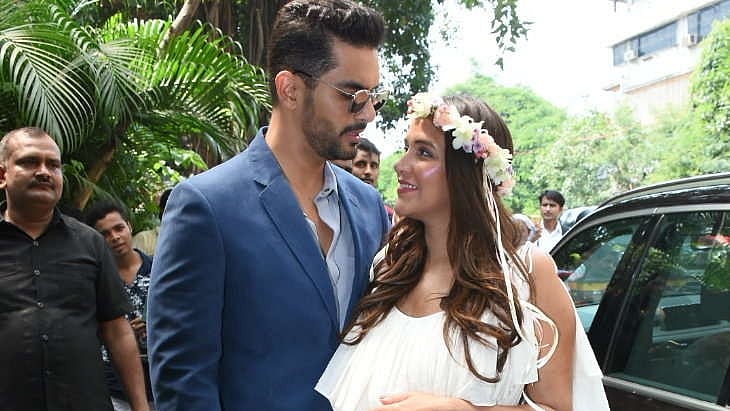 Angad Bedi and Neha Dhupia.&nbsp;