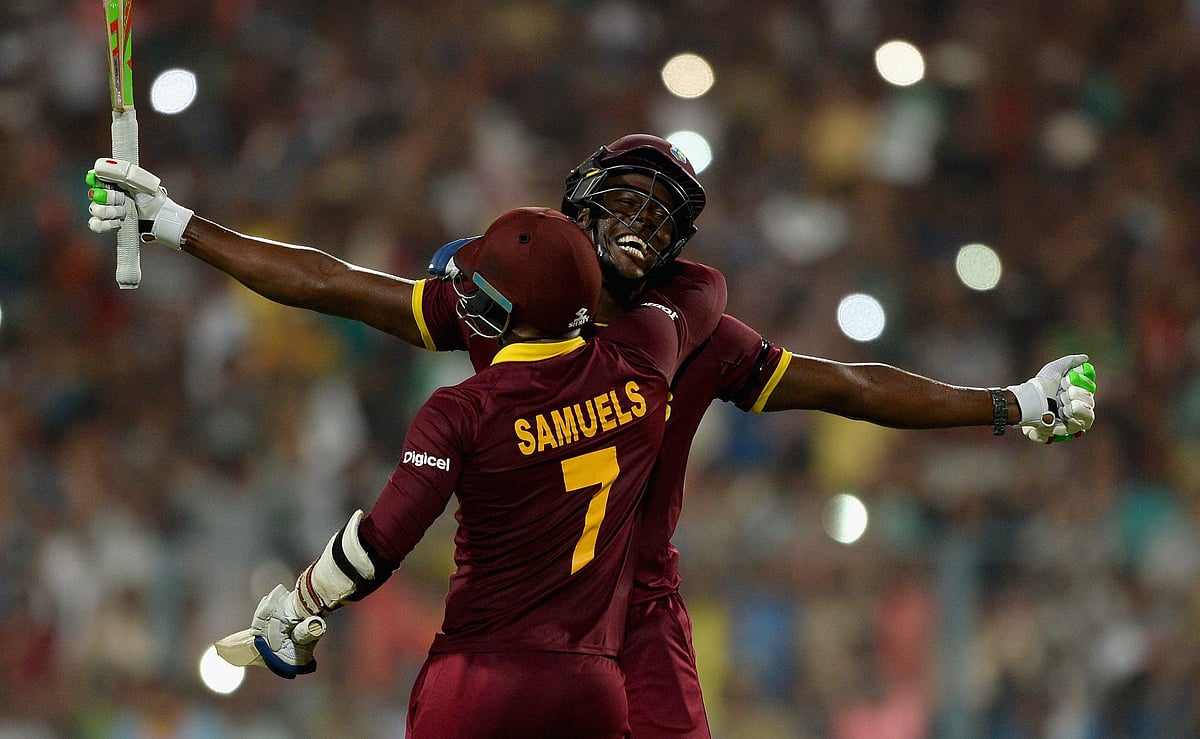 Carlos Brathwaite and Marlon Samuels celebrate after winning the 2016 ICC World T20.