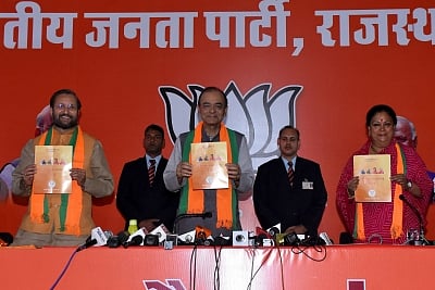 Jaipur: BJP leaders and Union Ministers Prakash Javadekar and Arun Jaitley with Rajasthan Chief Minister Vasundhara Raje at the release of party