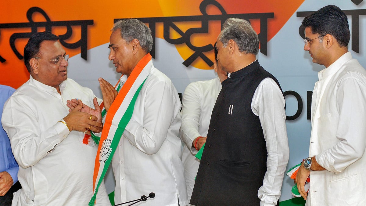 Congress general secretary and Rajasthan state party in-charge Avinash Pande welcomes Dausa BJP MP Harish Chandra Meena (2nd fron left) as he joins the party. 