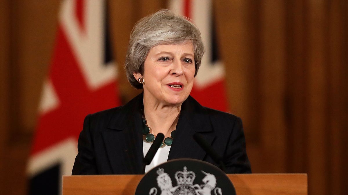 Theresa May addresses a press conference inside 10 Downing Street in London.