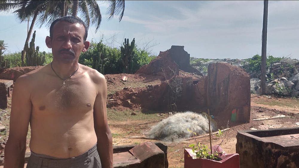 Budhwant Karvi, 40, visits the remains of his old home in Pavinarkurve village in Honnavar, Karnataka, on festivals and special occasions. To stop the erosion, the government constructed a stone wall, but it wasn’t enough to hold back the waves.
