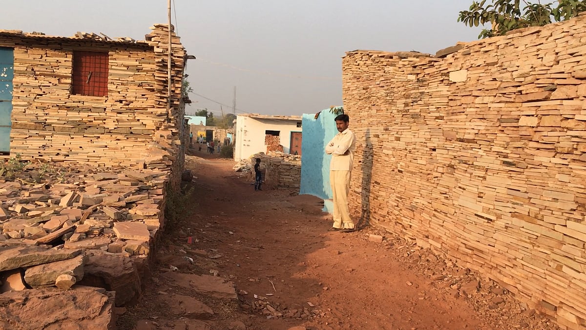 At least 500 people are living in the houses built of crushed stones, which are discarded by nearby factories.