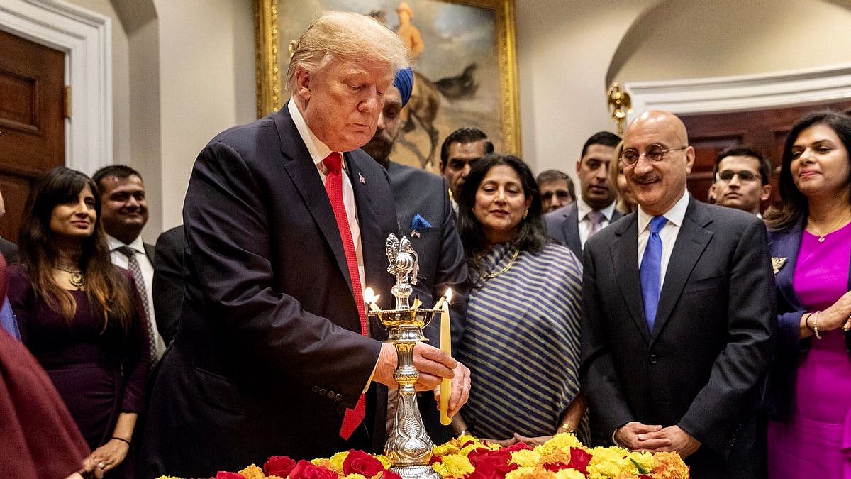 US President Donald Trump celebrates 