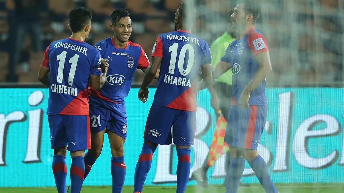 Bengaluru FC players celebrate their win by 1-0 during the match against Delhi Dynamos FC in Hero ISL on Monday.