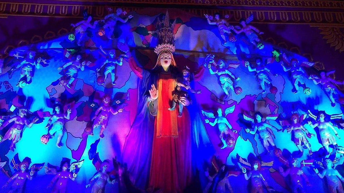 Goddess Kali’s idol at Barasat’s Nabapally Association, with a peaceful gaze and a child in its arms, has a striking resemblance to Mother Mary.