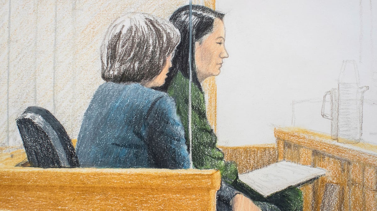 In this courtroom sketch, Meng Wanzhou (right), the chief financial officer of Huawei Technologies, sits beside a translator during a bail hearing at British Columbia Supreme Court in Vancouver.