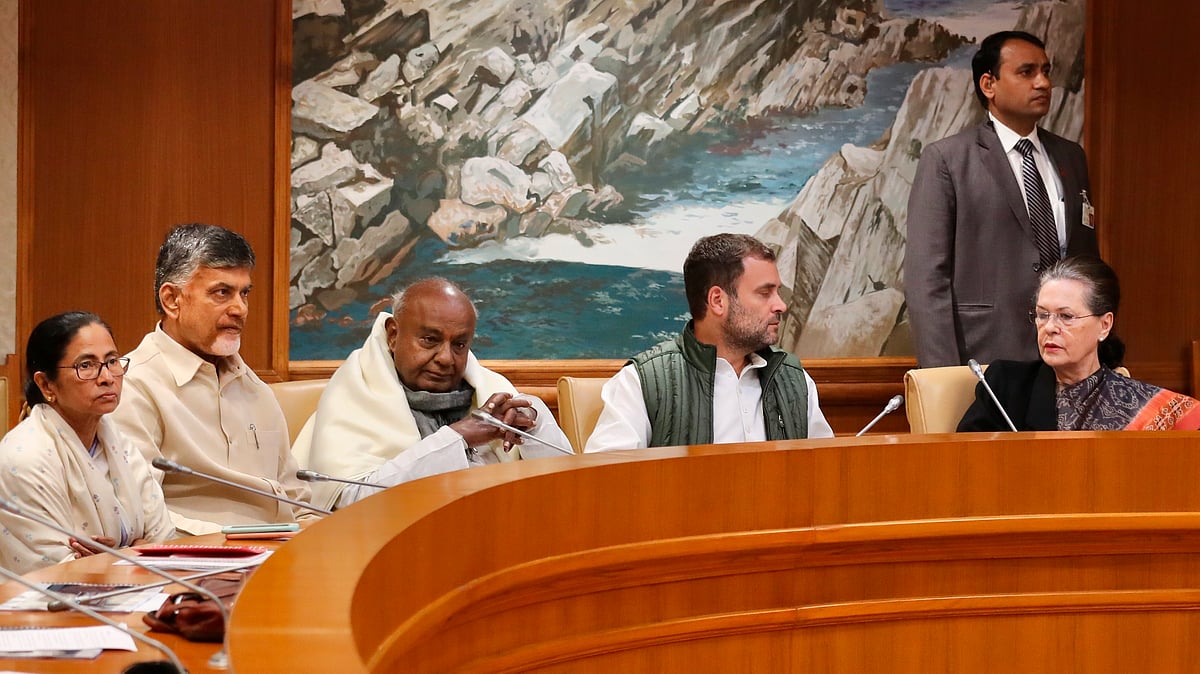 From left, West Bengal CM Mamata Banerjee, Andhra Pradesh CM Chandrababu Naidu, JDS chief Deve Gowda, Congress President Rahul Gandhi and Sonia Gandhi attend a meeting of Opposition parties in New Delhi.