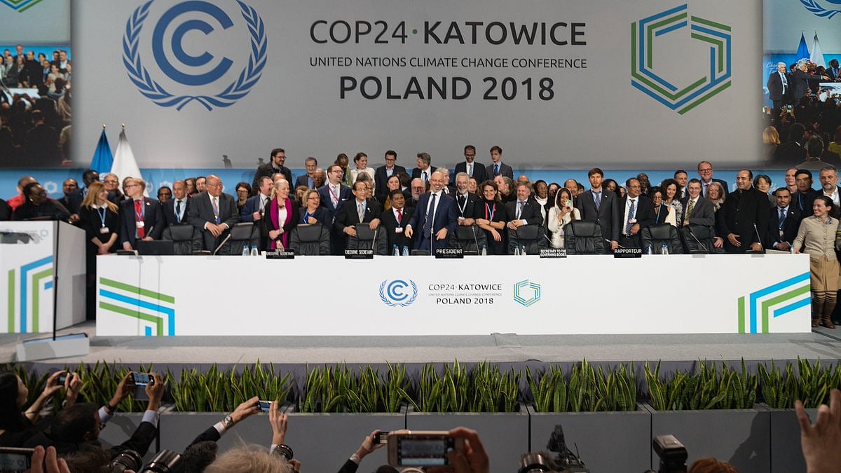 Delegates from nearly 200 states finalised a common rule book.