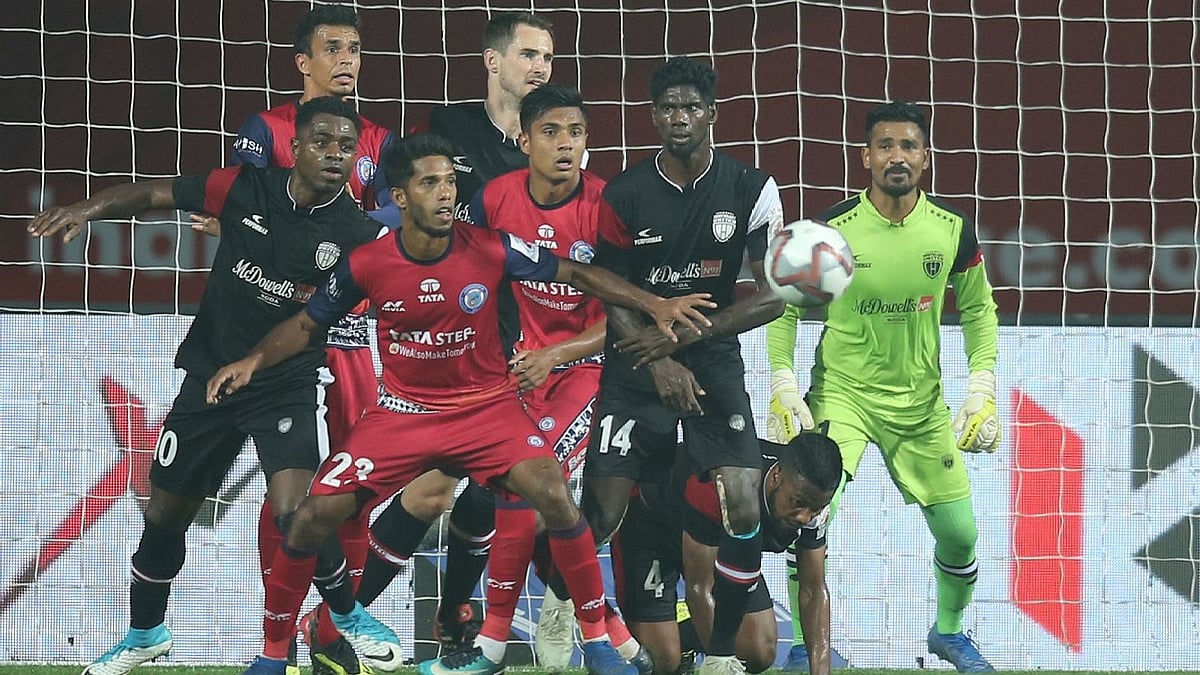 Jamshedpur FC and NorthEast United FC players in action during their match in Hero ISL on Saturday.