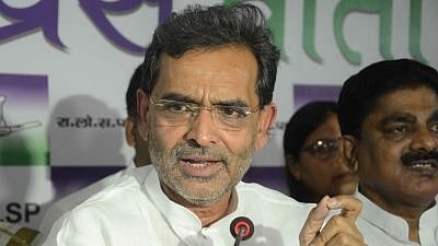 Minister of State for HRD Upendra Kushwaha addresses a press conference. 