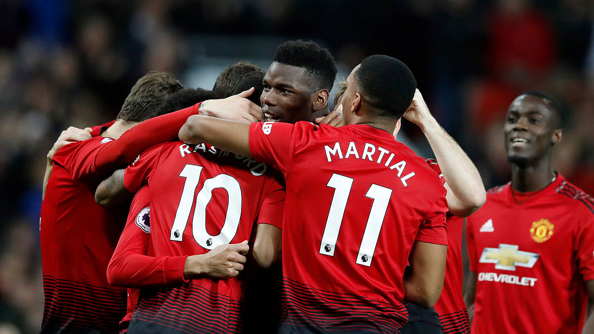Manchester United’s Paul Pogba celebrates scoring his side’s first goal of the game during the Premier League match at Old Trafford, Manchester. 
