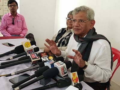 Agartala: CPI-M General Secretary Sitaram Yechury addresses a press conference in Agartala on Nov 26, 2018. (Photo: IANS)