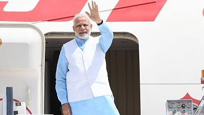 New Delhi: Prime Minister Narendra Modi departs from New Delhi for three-nation state visit to Rwanda, Uganda and South Africa, on July 23, 2018. 