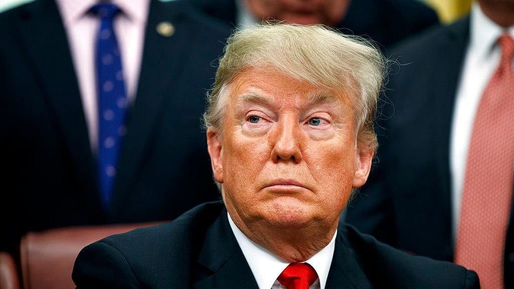 At a White House bill signing, Trump said the government is “totally prepared for a very long shutdown.”