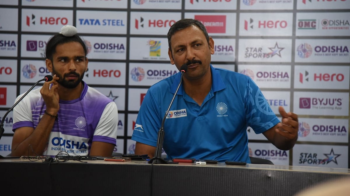 Indian hockey team chief coach Harendra Singh and forward turned midfielder Akashdeep Singh during a press conference in Bhubaneswar on Saturday, December 1, 2018.