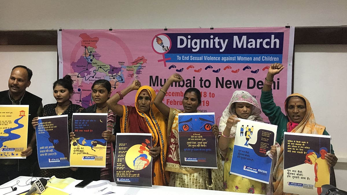 The convenor of Rashtriya Garima Abhiyan, along with sexual violence survivors, including Bhanwari Devi, at the press conference.