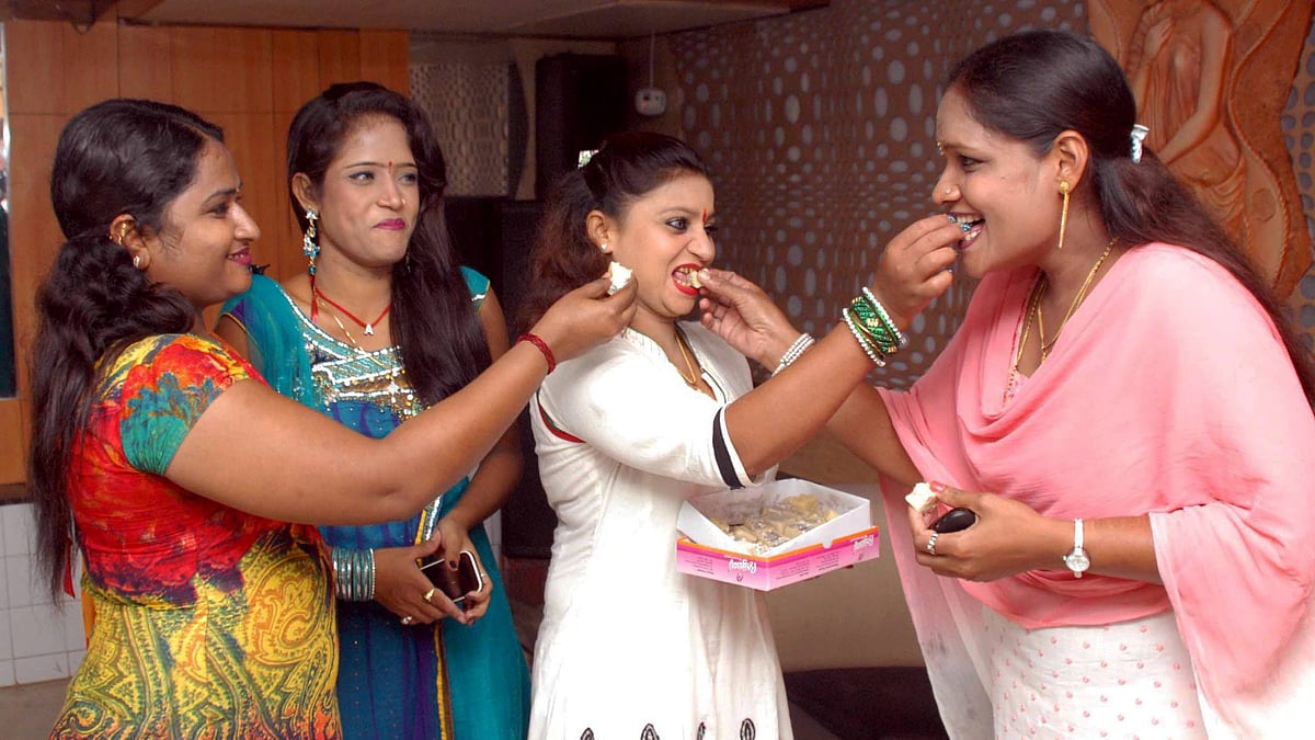  In this file photo dated 16 July 2013, performers at dance bars celebrate the court’s ruling in Mumbai.
