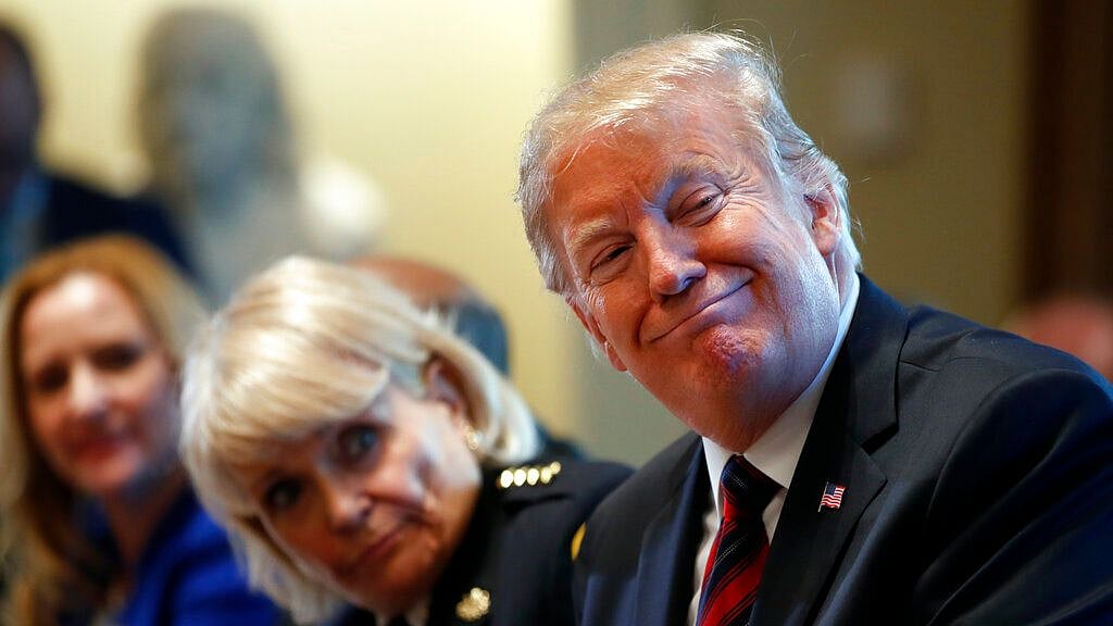 President Donald Trump leads a roundtable discussion on border security with local leaders on Friday,11 January, 2019, in the Cabinet Room of the White House in Washington.