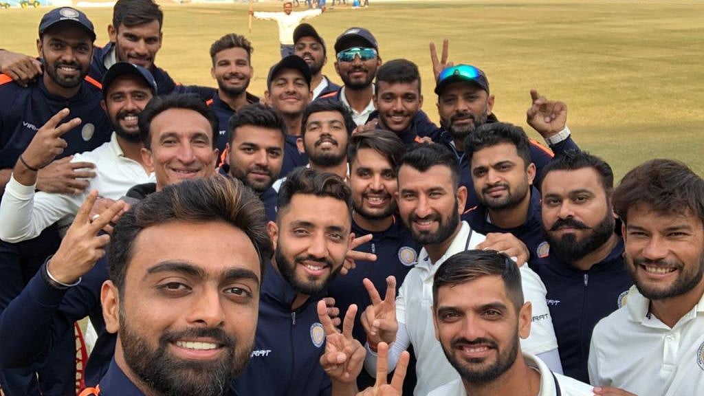 The Saurashtra team celebrates after completing an all-time record chase to enter the Ranji Trophy 2018/19 semi-finals.