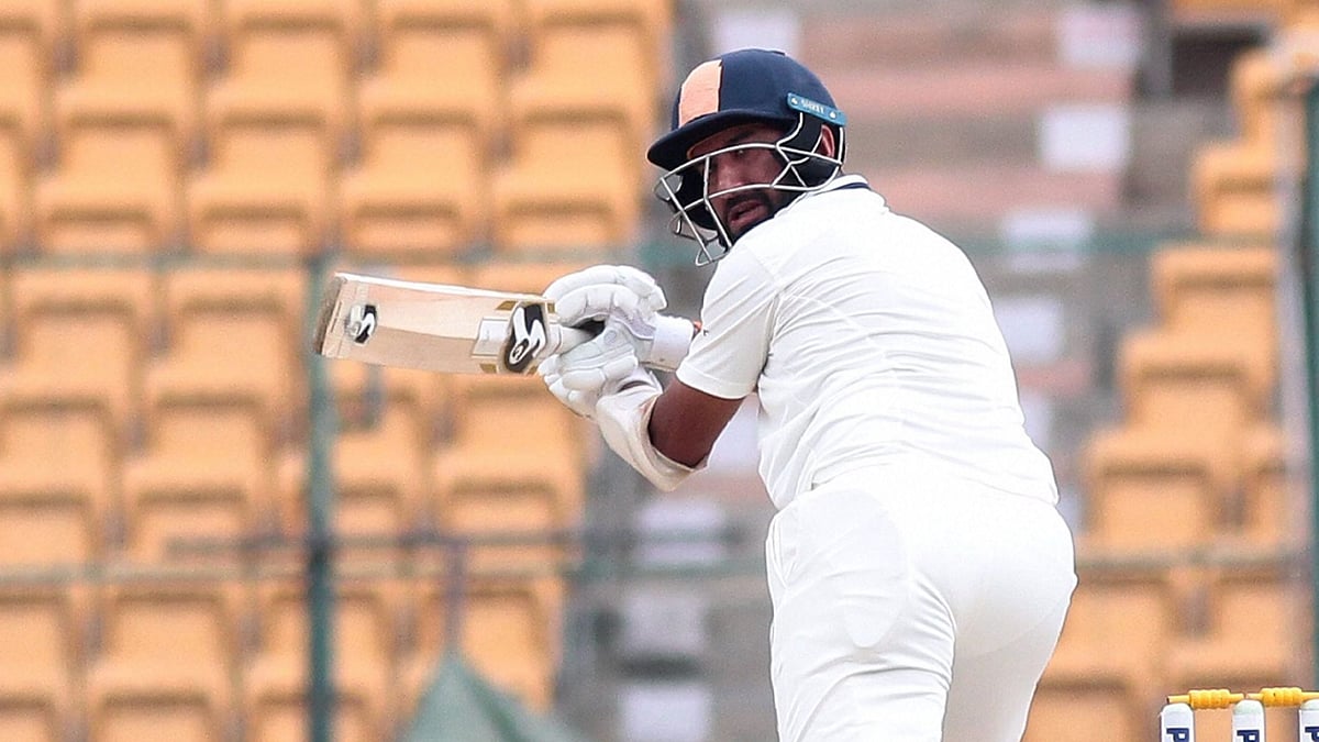 Cheteshwar Pujara put Saurashtra on brink of a victory with an unbeaten hundred in the Ranji Trophy semi-final against Karnataka.